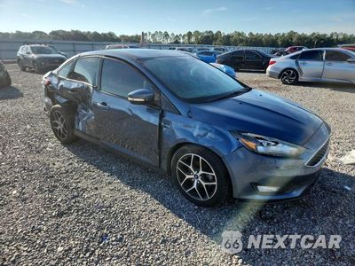 Czwarte zdjęcie samochodu z boku: 2018 FORD FOCUS VIN:1FADP3H22JL201912 - miniatura