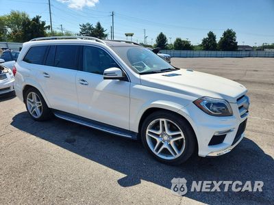 Czwarte zdjęcie samochodu z boku: 2014 MERCEDES-BENZ GL 550 4MATIC VIN:4JGDF7DE0EA303758 - miniatura