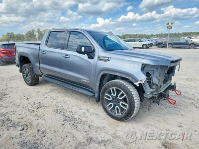 Czwarte zdjęcie samochodu z boku: 2021 GMC SIERRA K1500 AT4 VIN:3GTP9EED7MG447231 - miniatura