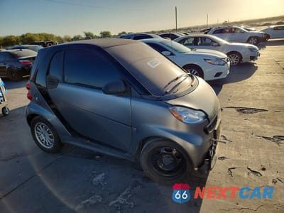 Czwarte zdjęcie samochodu z boku: 2013 SMART FORTWO PURE VIN:WMEEJ3BA1DK687771 - miniatura
