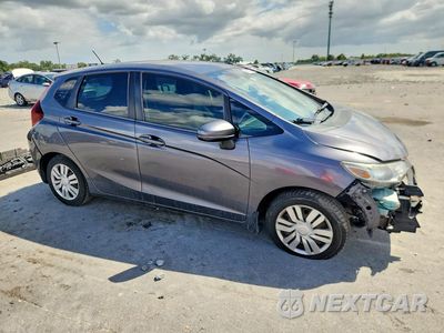 Czwarte zdjęcie samochodu z boku: 2015 HONDA FIT LX VIN:3HGGK5H57FM708534 - miniatura