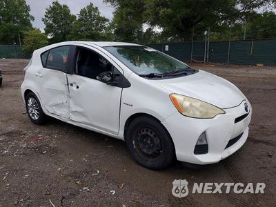 Czwarte zdjęcie samochodu z boku: 2012 TOYOTA PRIUS C TWO VIN:JTDKDTB36C1012318 - miniatura