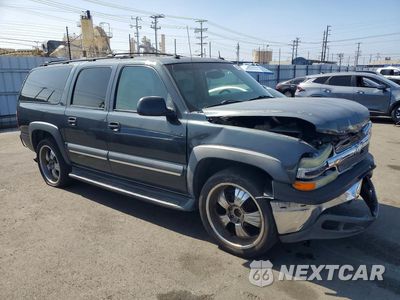 Czwarte zdjęcie samochodu z boku: 2003 CHEVROLET SUBURBAN C1500 VIN:1GNEC16T43J267104 - miniatura