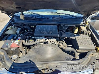 Zdjęcie 12 z 14 samochodu: 2000 JEEP GRAND CHEROKEE LAREDO VIN:1J4GW48N7YC109788 - miniatura