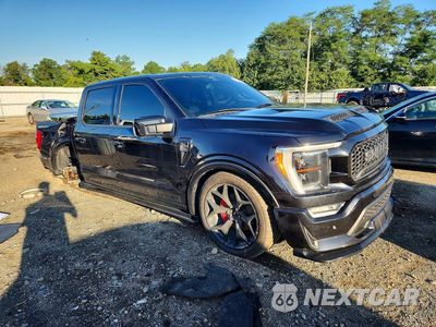Czwarte zdjęcie samochodu z boku: 2022 FORD F150 SUPERCREW VIN:1FTFW1E54NKE58574 - miniatura
