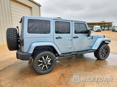 Trzecie zdjęcie samochodu z tyłu: 2012 JEEP WRANGLER UNLIMITED SAHARA VIN:1C4BJWEG6CL148655 - miniatura
