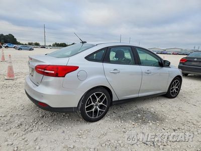 Trzecie zdjęcie samochodu z tyłu: 2017 FORD FOCUS SEL VIN:1FADP3H28HL290122 - miniatura