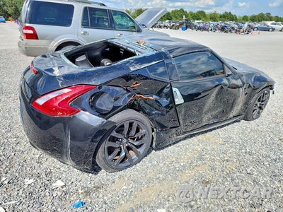 Trzecie zdjęcie samochodu z tyłu: 2016 NISSAN 370Z BASE VIN:JN1AZ4EH1GM930687 - miniatura