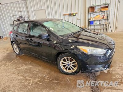 Czwarte zdjęcie samochodu z boku: 2018 FORD FOCUS SE VIN:1FADP3K24JL315290 - miniatura