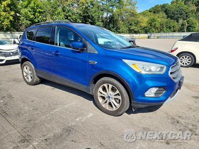 Czwarte zdjęcie samochodu z boku: 2017 FORD ESCAPE SE VIN:1FMCU9GD0HUC39188 - miniatura