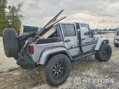 Trzecie zdjęcie samochodu z tyłu: 2013 JEEP WRANGLER UNLIMITED SAHARA VIN:1C4BJWEG3DL648970 - miniatura