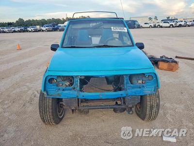 Piąte zdjęcie samochodu w środku: 1992 CHEVROLET TRACKER VIN:2CNBE18U0N6916856 - miniatura