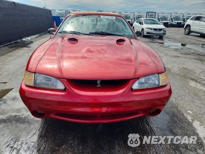 Piąte zdjęcie samochodu w środku: 1998 FORD MUSTANG COBRA VIN:1FAFP46V0WF178728 - miniatura