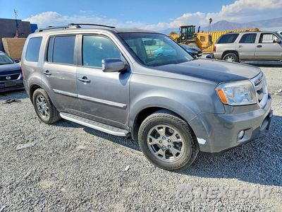 Czwarte zdjęcie samochodu z boku: 2009 HONDA PILOT TOURING VIN:5FNYF48959B031285 - miniatura