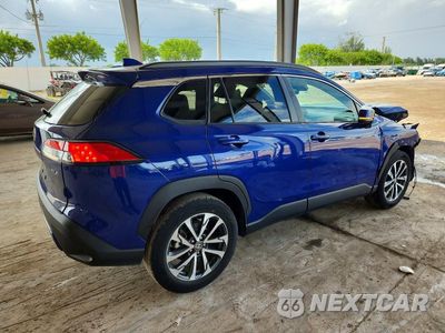 Trzecie zdjęcie samochodu z tyłu: 2023 TOYOTA COROLLA CROSS XLE VIN:7MUDAAAGXPV063510 - miniatura