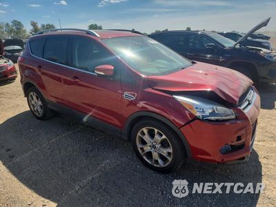 Czwarte zdjęcie samochodu z boku: 2016 FORD ESCAPE TITANIUM VIN:1FMCU9J91GUB32427 - miniatura