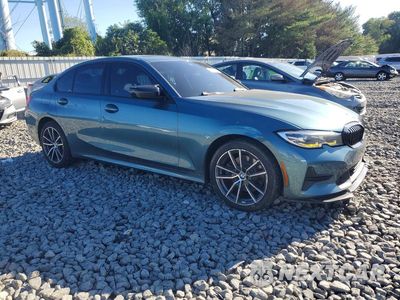 Czwarte zdjęcie samochodu z boku: 2021 BMW 330XI VIN:3MW5R7J01M8B73067 - miniatura