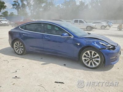 Czwarte zdjęcie samochodu z boku: 2018 TESLA MODEL 3 VIN:5YJ3E1EA8JF164198 - miniatura