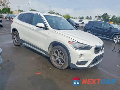 Czwarte zdjęcie samochodu z boku: 2019 BMW X1 XDRIVE28I VIN:WBXHT3C52K3H36173 - miniatura