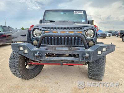Piąte zdjęcie samochodu w środku: 2015 JEEP WRANGLER UNLIMITED SAHARA VIN:1C4BJWEG9FL648605 - miniatura