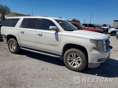 Czwarte zdjęcie samochodu z boku: 2020 CHEVROLET SUBURBAN C1500 LT VIN:1GNSCHKC6LR161837 - miniatura