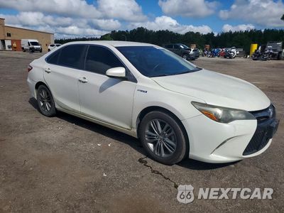 Czwarte zdjęcie samochodu z boku: 2015 TOYOTA CAMRY HYBRID SE VIN:4T1BD1FK8FU142881 - miniatura
