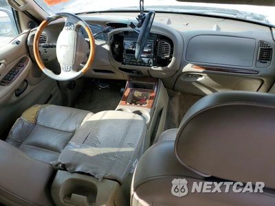 Zdjęcie 8 z 13 samochodu: 2000 LINCOLN NAVIGATOR VIN:5LMRU27A4YLJ08369 - miniatura