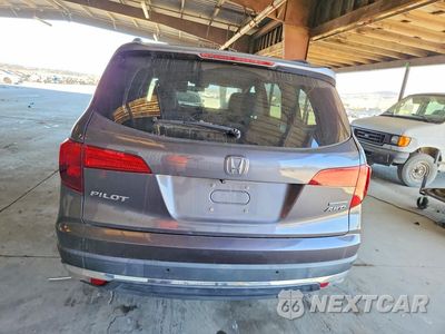 Zdjęcie 6 z 14 samochodu: 2018 HONDA PILOT TOURING VIN:5FNYF6H95JB034798 - miniatura