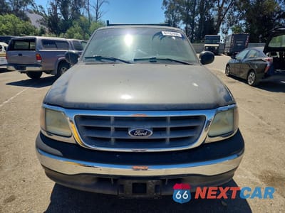 Piąte zdjęcie samochodu w środku: 2003 FORD F150 VIN:1FTRX17213NA99497 - miniatura
