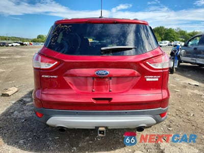 Zdjęcie 6 z 13 samochodu: 2013 FORD ESCAPE TITANIUM VIN:1FMCU0J90DUD76058 - miniatura