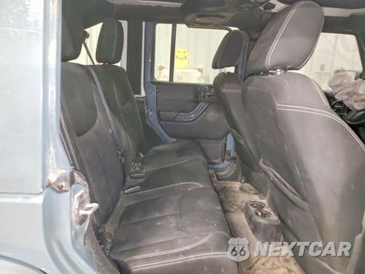 Zdjęcie 11 z 14 samochodu: 2014 JEEP WRANGLER UNLIMITED SAHARA VIN:1C4BJWEG8EL224251 - miniatura