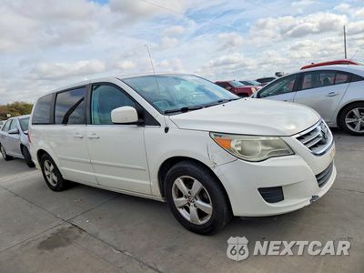 Czwarte zdjęcie samochodu z boku: 2010 VOLKSWAGEN ROUTAN SE VIN:2V4RW3D13AR184535 - miniatura