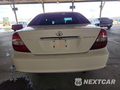 Zdjęcie 6 z 12 samochodu: 2002 TOYOTA CAMRY LE VIN:4T1BE32K02U078070 - miniatura