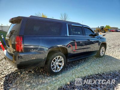 Trzecie zdjęcie samochodu z tyłu: 2017 CHEVROLET SUBURBAN K1500 LT VIN:1GNSKHKCXHR217451 - miniatura