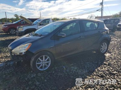 2014 TOYOTA PRIUS C FOUR JTDKDTB3XE1574175 - główne zdjęcie licytacji z USA - miniatura