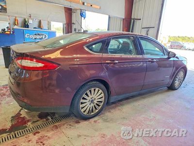 Trzecie zdjęcie samochodu z tyłu: 2016 FORD FUSION S HYBRID VIN:3FA6P0UU0GR405732 - miniatura