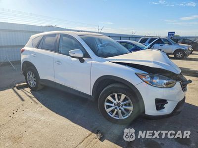Czwarte zdjęcie samochodu z boku: 2016 MAZDA CX-5 TOURING VIN:JM3KE2CY0G0800273 - miniatura