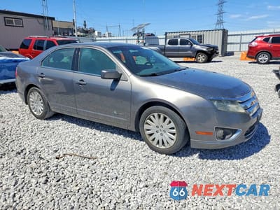 Czwarte zdjęcie samochodu z boku: 2011 FORD FUSION HYBRID VIN:3FADP0L35BR110201 - miniatura