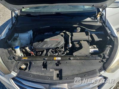 Zdjęcie 12 z 14 samochodu: 2017 HYUNDAI SANTA FE SPORT 2.0T VIN:5NMZU4LA7HH040062 - miniatura