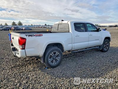 Trzecie zdjęcie samochodu z tyłu: 2017 TOYOTA TACOMA SR5 V6 VIN:5TFDZ5BN7HX017197 - miniatura