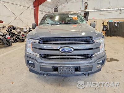 Piąte zdjęcie samochodu w środku: 2018 FORD F150 SUPER CAB VIN:1FTFX1EG7JFD09061 - miniatura