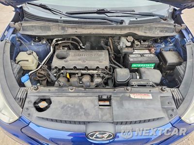 Zdjęcie 11 z 12 samochodu: 2011 HYUNDAI TUCSON GLS VIN:KM8JUCAC4BU134763 - miniatura