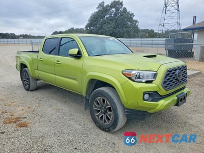 Czwarte zdjęcie samochodu z boku: 2023 TOYOTA TACOMA TRD SPORT VIN:3TYDZ5BN3PT027329 - miniatura