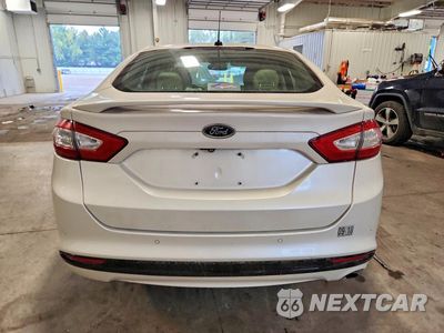 Zdjęcie 6 z 12 samochodu: 2014 FORD FUSION TITANIUM HEV VIN:3FA6P0RU6ER393284 - miniatura
