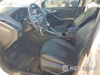 Zdjęcie 7 z 13 samochodu: 2013 FORD FOCUS TITANIUM VIN:1FADP3J26DL210546 - miniatura