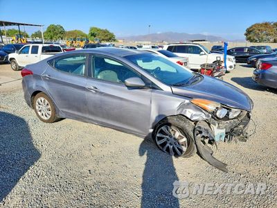 Czwarte zdjęcie samochodu z boku: 2012 HYUNDAI ELANTRA GLS VIN:KMHDH4AE5CU302940 - miniatura