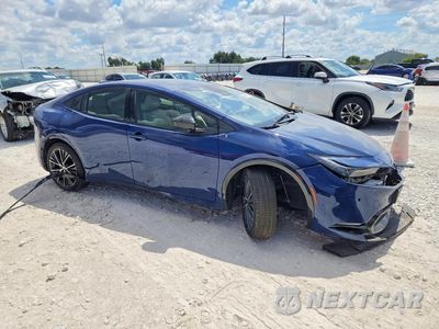 Czwarte zdjęcie samochodu z boku: 2023 TOYOTA PRIUS XLE VIN:JTDACAAUXP3012720 - miniatura