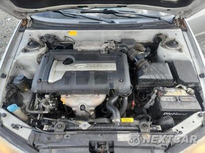 Zdjęcie 11 z 12 samochodu: 2005 HYUNDAI ELANTRA GLS VIN:KMHDN46D85U163592 - miniatura