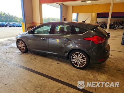 Drugie zdjęcie samochodu z przodu: 2016 FORD FOCUS TITANIUM VIN:1FADP3N20GL323424 - miniatura