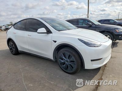Czwarte zdjęcie samochodu z boku: 2024 TESLA MODEL Y VIN:7SAYGDED0RA302663 - miniatura